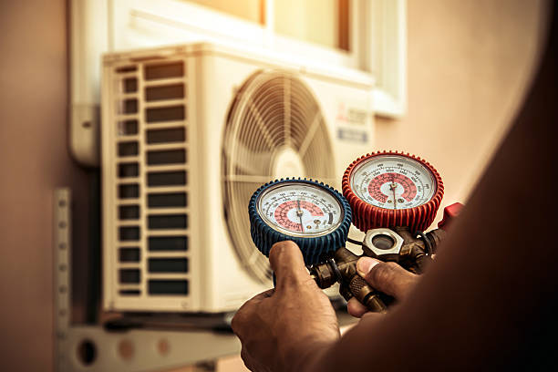 Professional Hvac Maintenance technician working in Huletts Landing, NY